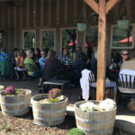 Pebblestone's porch is a great place for music and wine