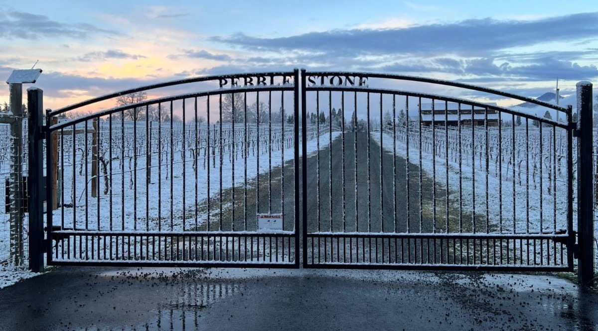 Pebblestone gate leads to the Tasting Barn